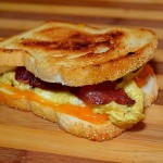 Toasted bacon egg and cheese breakfast sandwich