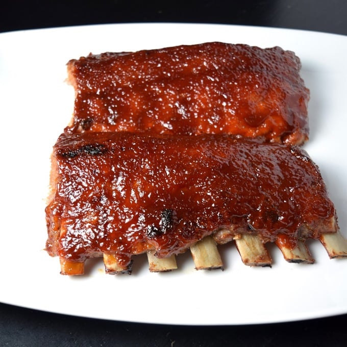 Bones sticking out of bbq ribs cooked in the oven at 350 degrees