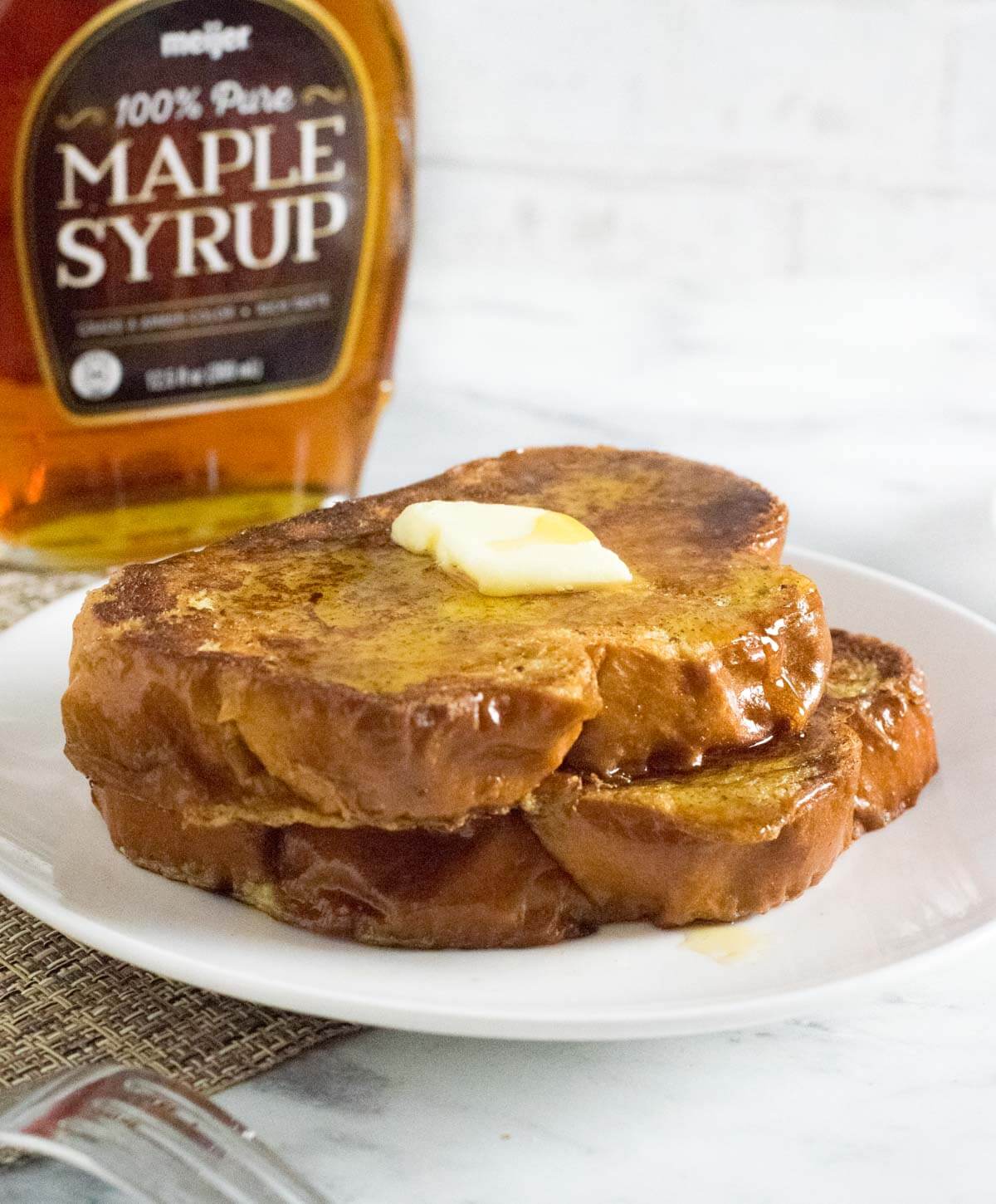 French toast served with maple syrup.