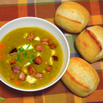 Split pea soup with ham and bread rolls