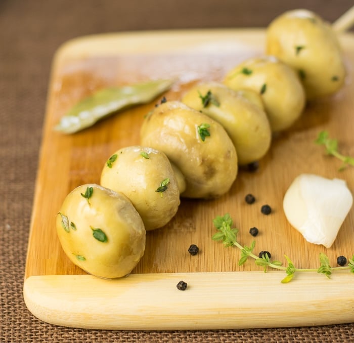 Lemon and thyme marinated mushrooms in oil