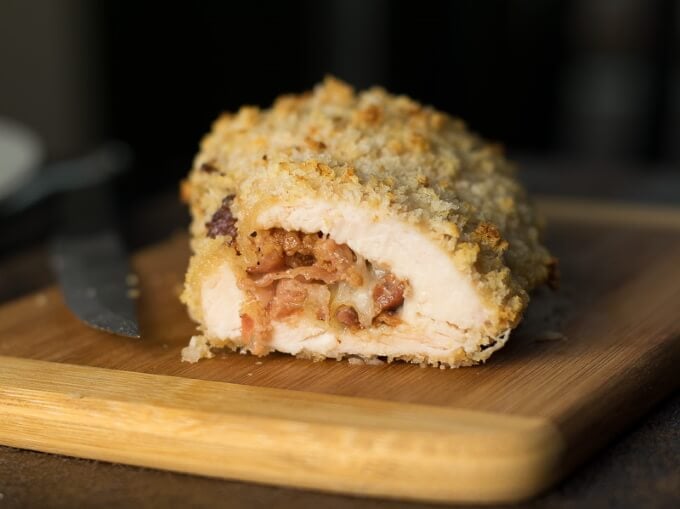 Panko Crusted Chicken breasts on cutting board.