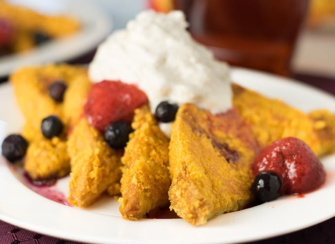 Captain Crunch French Toast recipe with cinnamon whipped cream and berries.