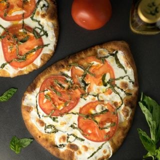 Easy Margherita Pizza on baking sheet