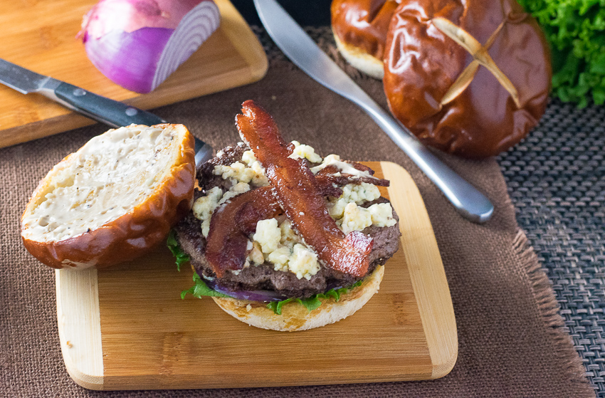 Toppings on a bacon blue cheese burger.