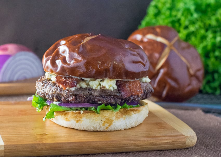 Bacon Blue Cheese Burger with Balsamic Mayo sitting on cutting board.