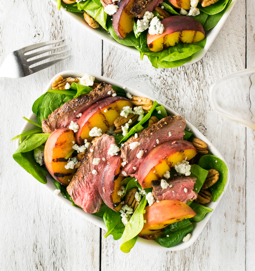 Grilled steak and peach salad with pecans blue cheese and red wine vinaigrette