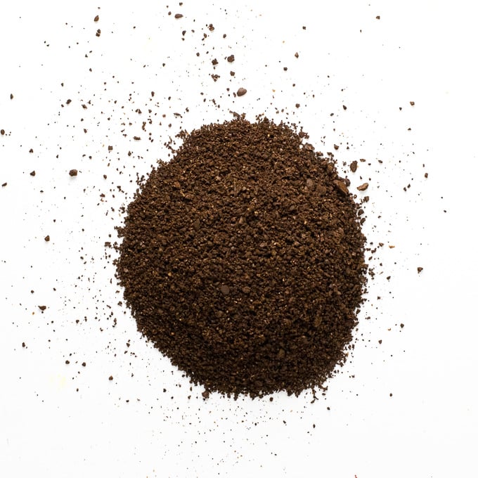 Ground coffee on white background.