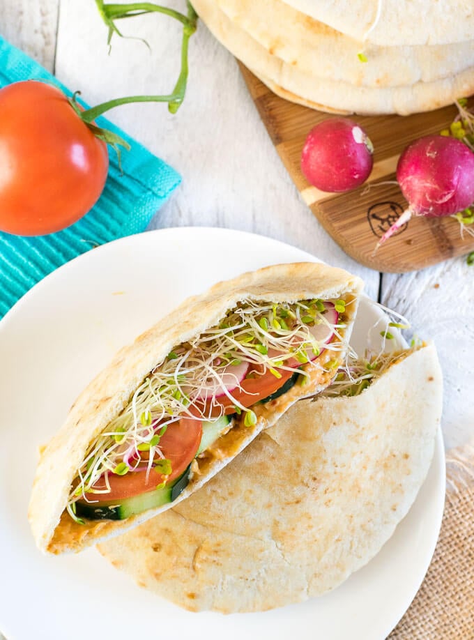 Above view of pita bread filled with vegetables