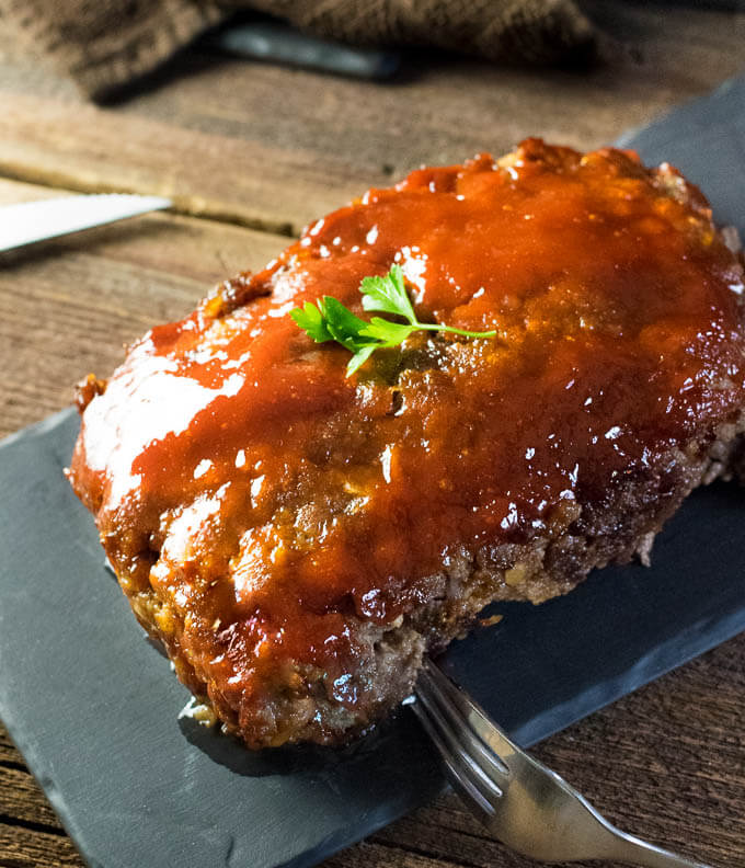 Brown Sugar Meatloaf resting on tray.