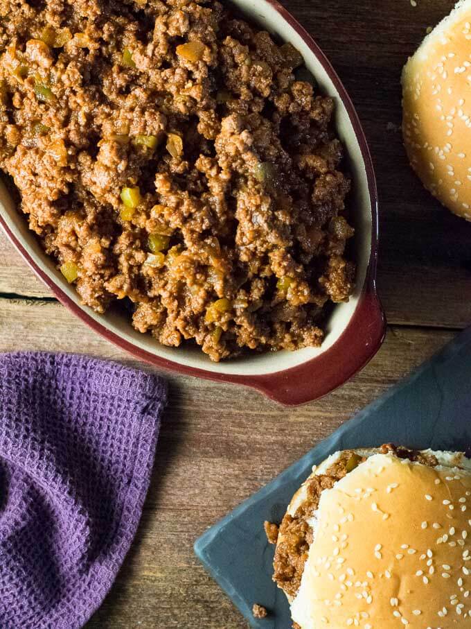 Bowl of sloppy Joe meat and buns.