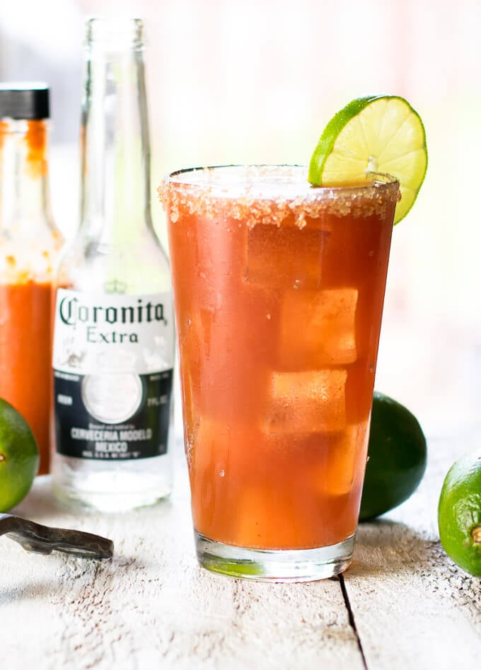 Authentic Michelada with lime garnish