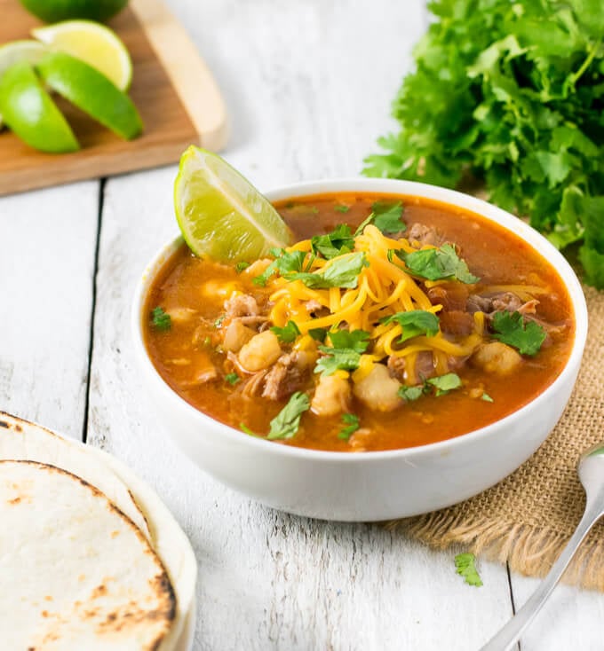 Serving slow Cooker Mexican Soup.