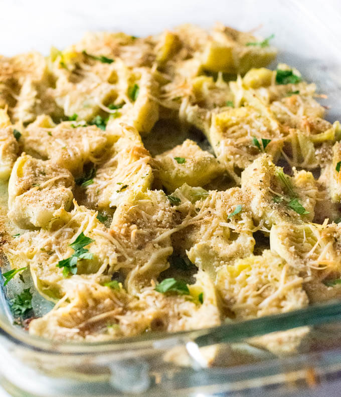 Baked Artichoke Hearts served as an appetizer.