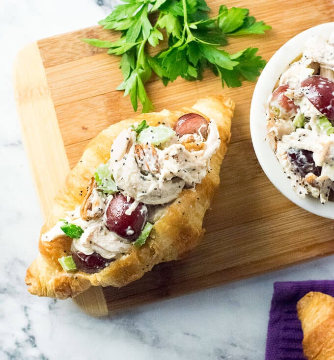 Chicken salad served with croissant. 