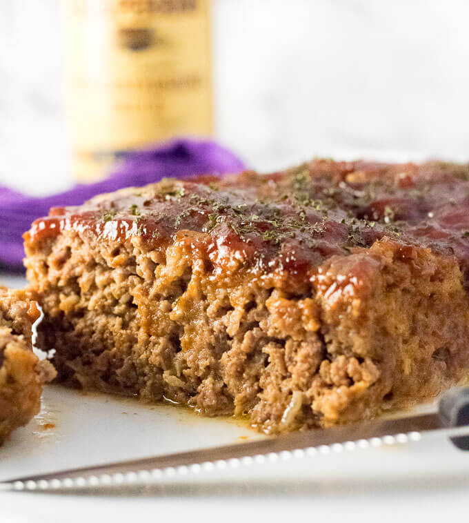 Serving old fashioned meatloaf.