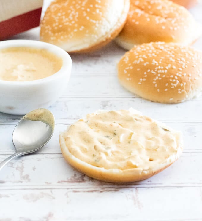 McDonald's Special Sauce spread on a sesame seed bun.