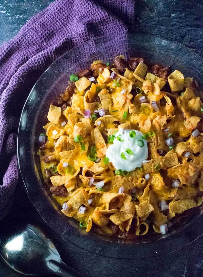Texas Frito Pie loaded with toppings.