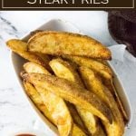 These steak fries are oven baked with a crisp seasoned crust. The perfect side dish! #fries #sidedish