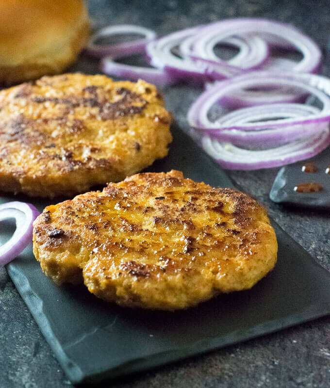 Making chicken burger patties.