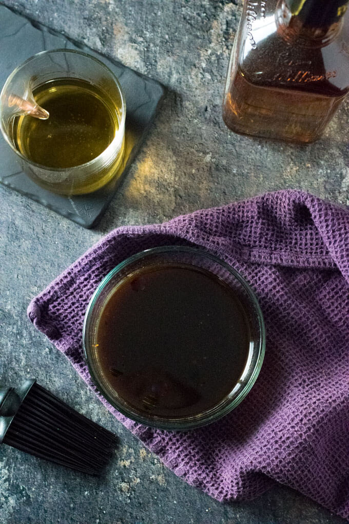 How to Make Bourbon glaze, showing glaze in glass bowl.