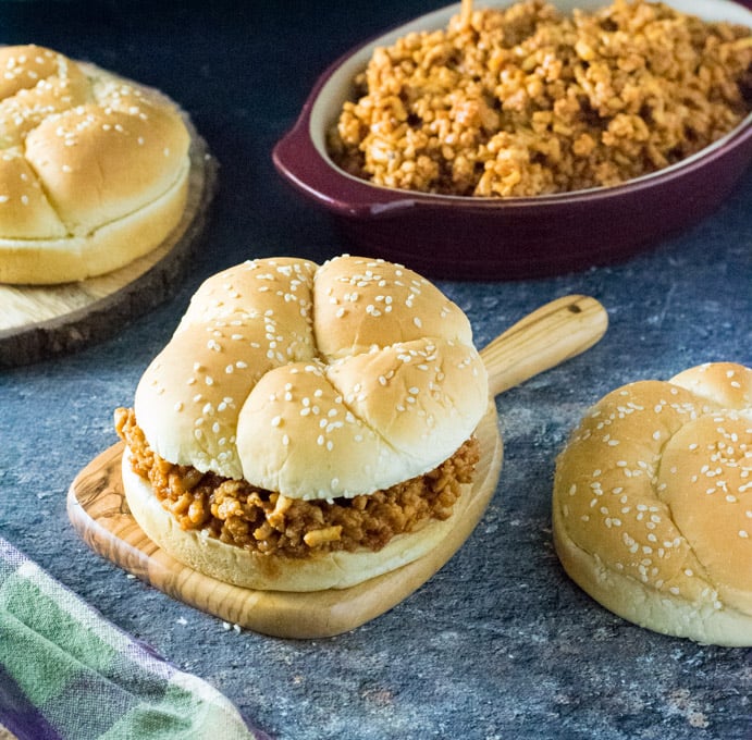 Serving ground chicken sloppy Joe on hamburger bun.