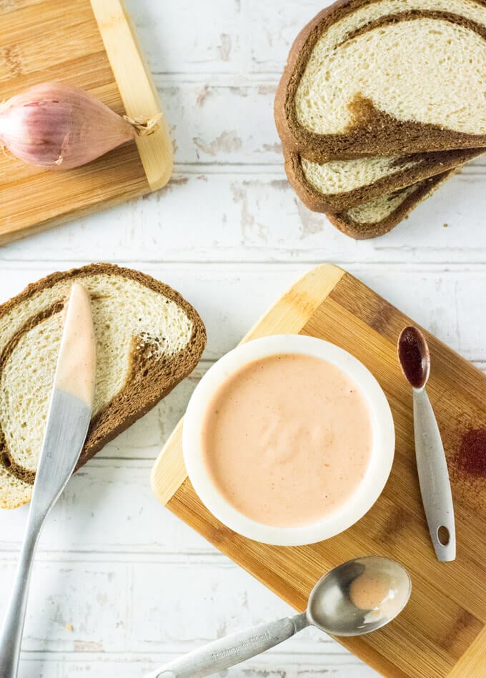 Homemade Russian dressing spread on sandwich.