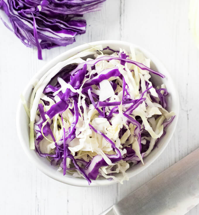 https://www.foxvalleyfoodie.com/wp-content/uploads/2019/11/how-to-cut-cabbage.jpg