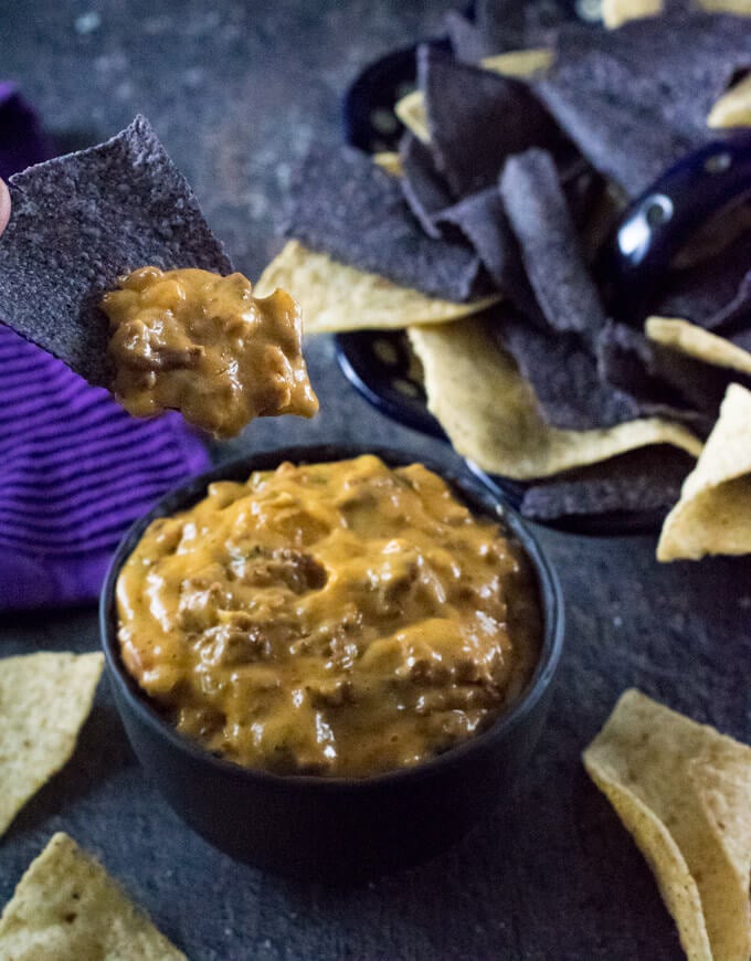 Nacho salsa dip with tortilla chips.