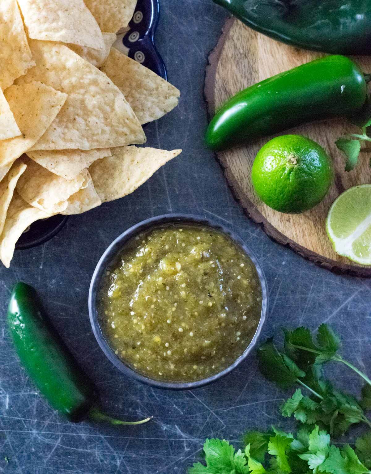 How to make tomatillo salsa - salsa viewed from above with chips and peppers