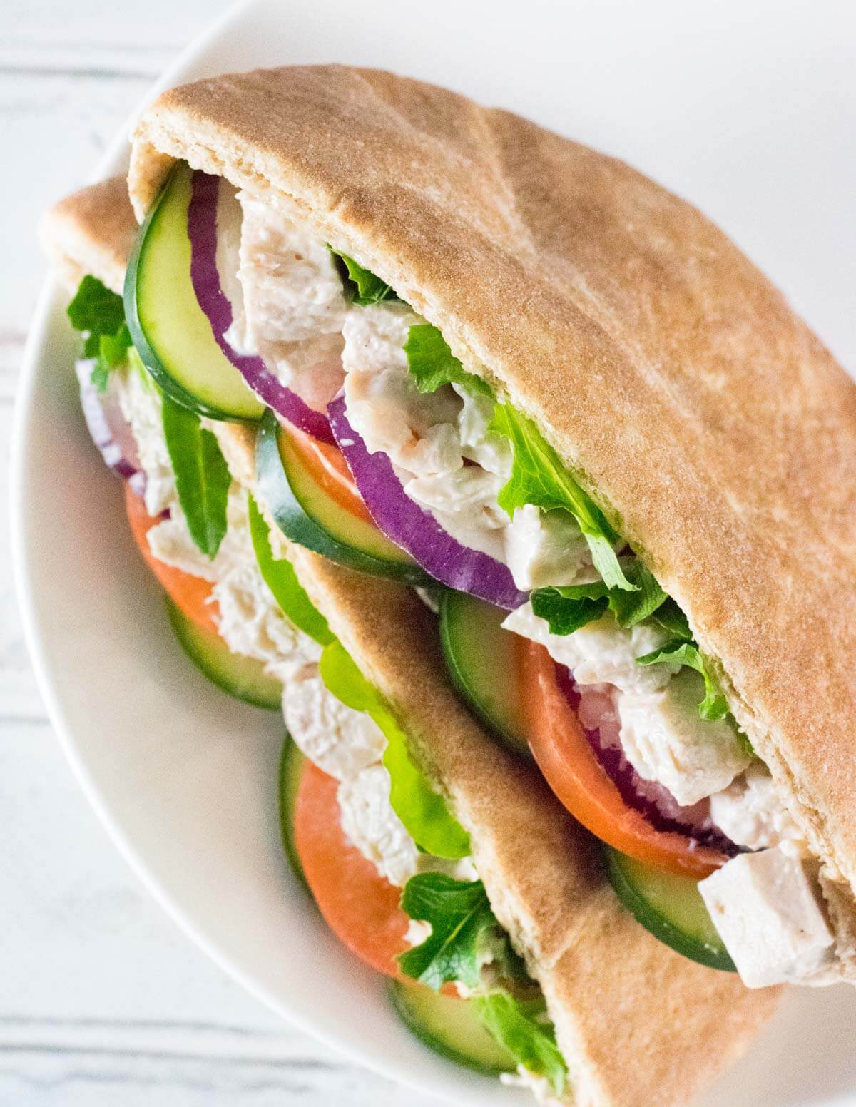 Easy chicken pitas with fresh veggies.