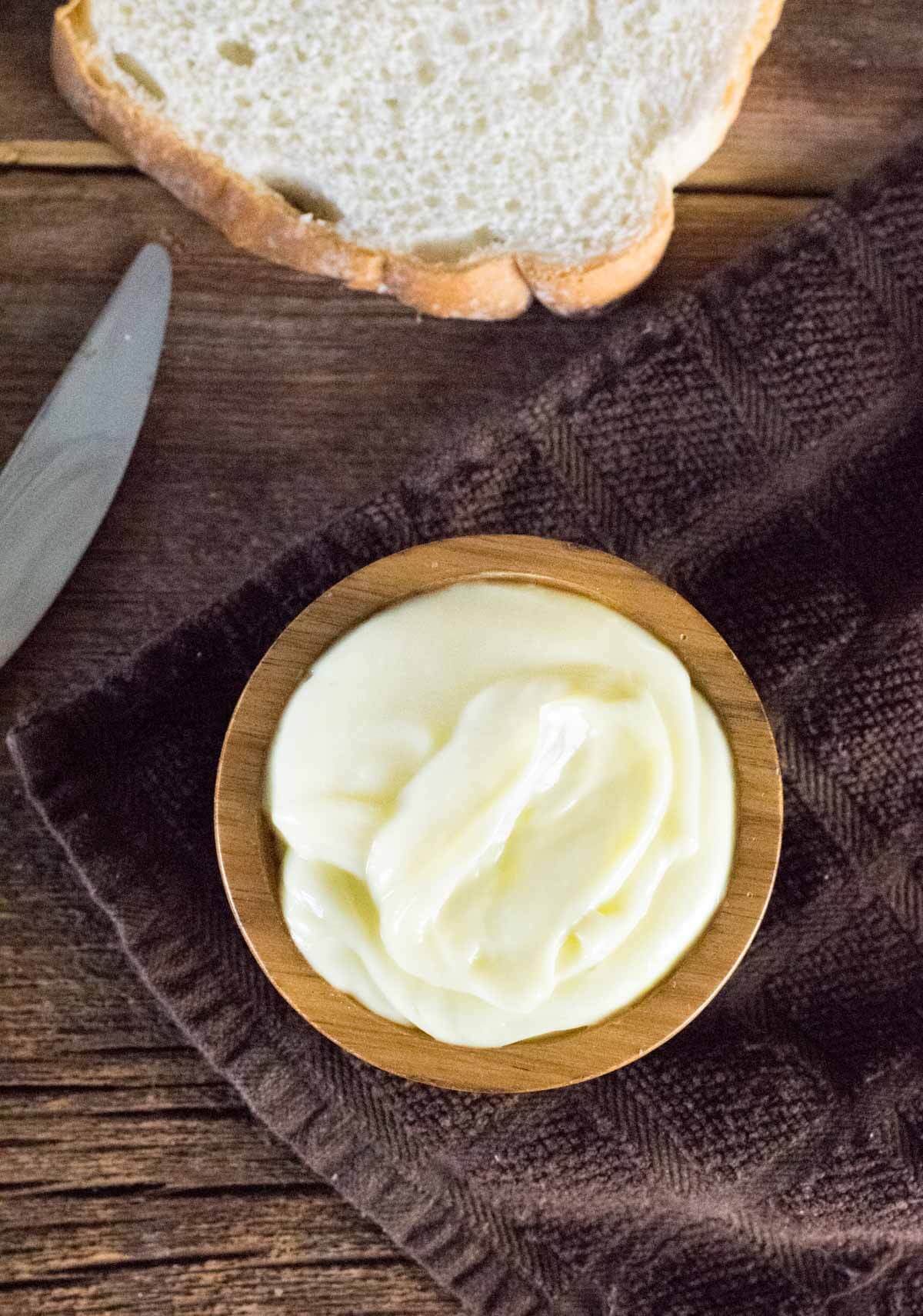 Homemade Mayonnaise in brown bowl.