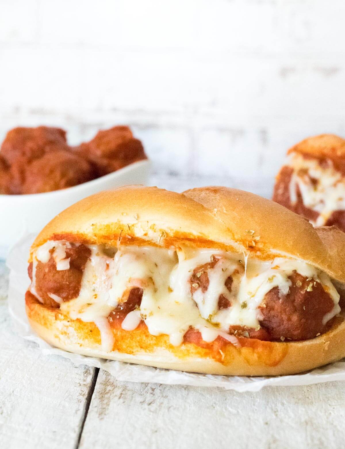 Baked meatball sub shown close up.