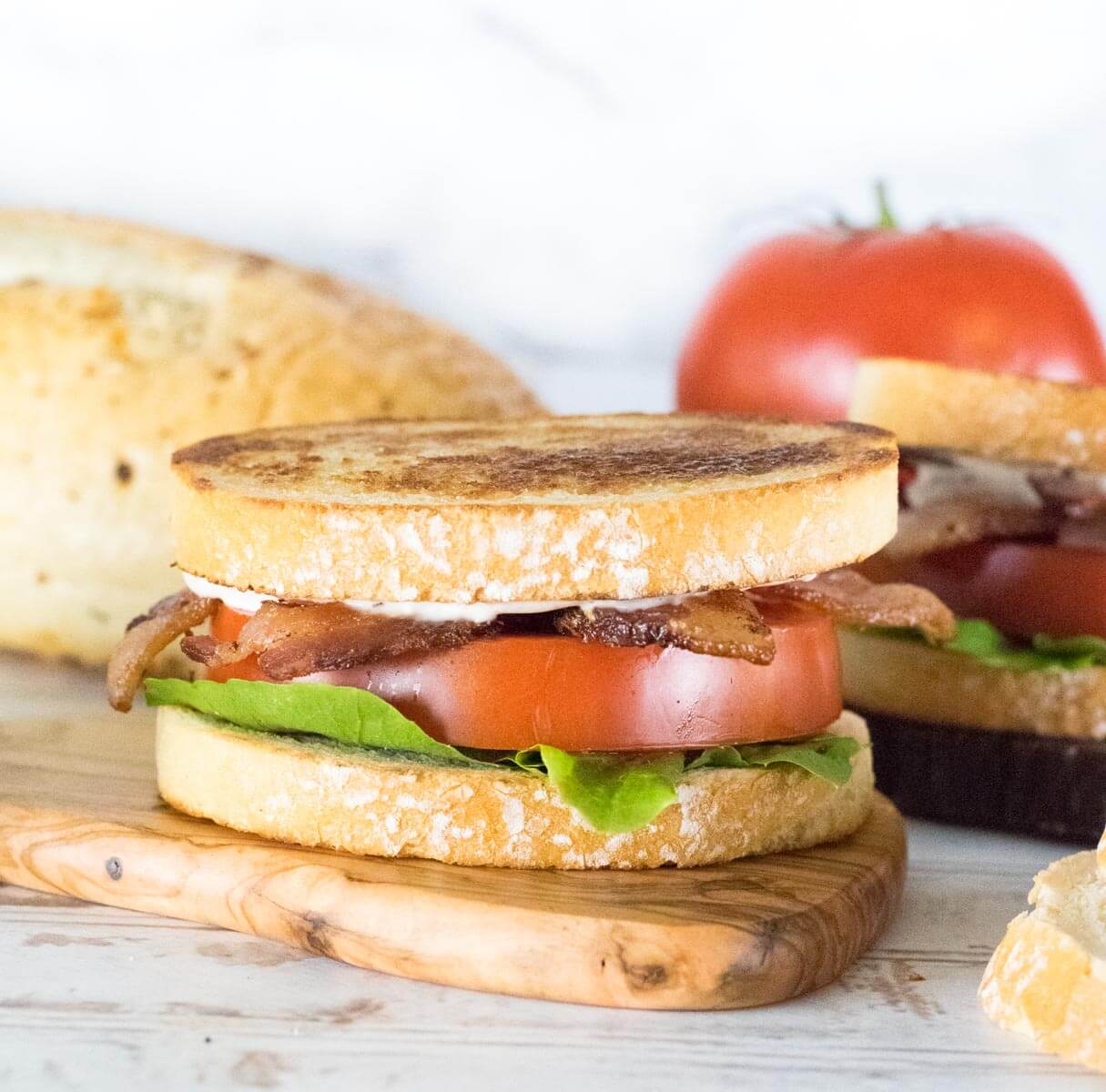 Ultimate BLT with sourdough, thick cut tomato, bacon, and lettuce.