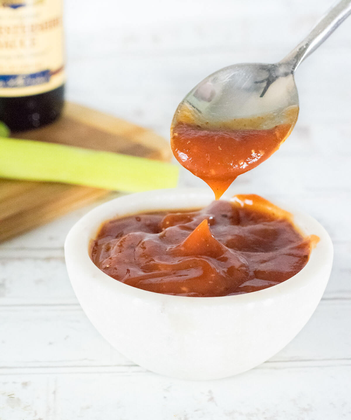 Bloody Mary ketchup dipped with spoon.