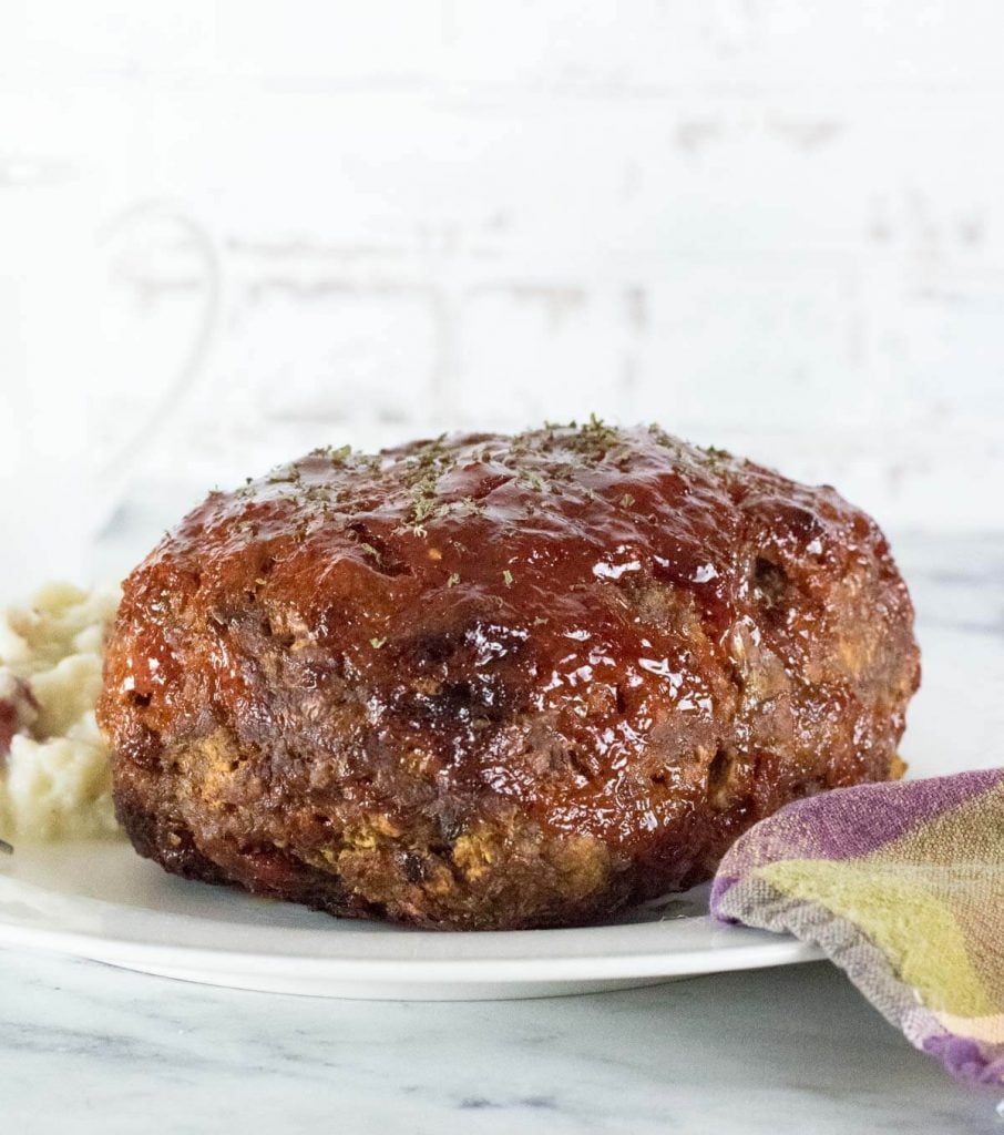 Cooked Bison Meatloaf that is not sliced.