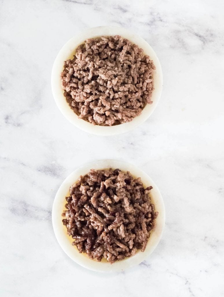 Two bowls of cooked beef, one browned, one not.