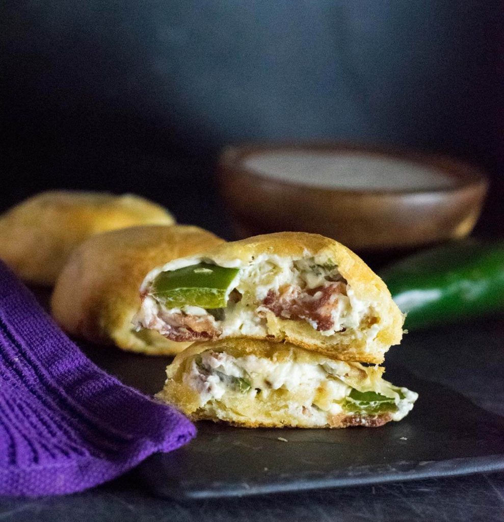 Jalapeno Popper Bites inside with bacon and jalapeno showing.