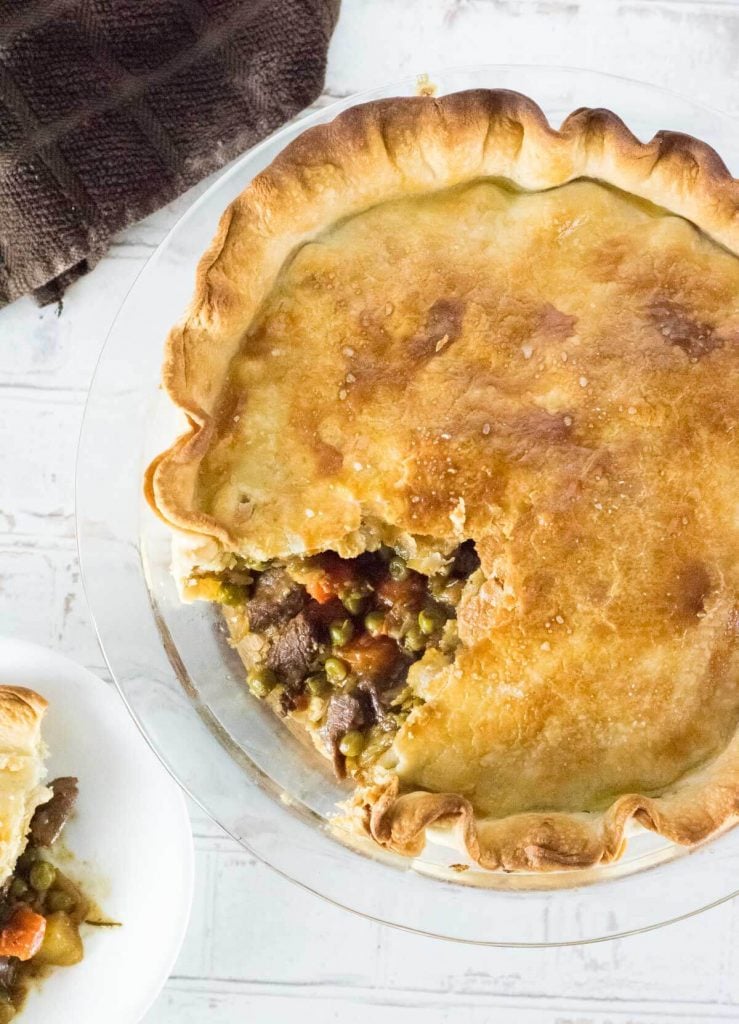 Venison Pot Pie with one slice cut out.