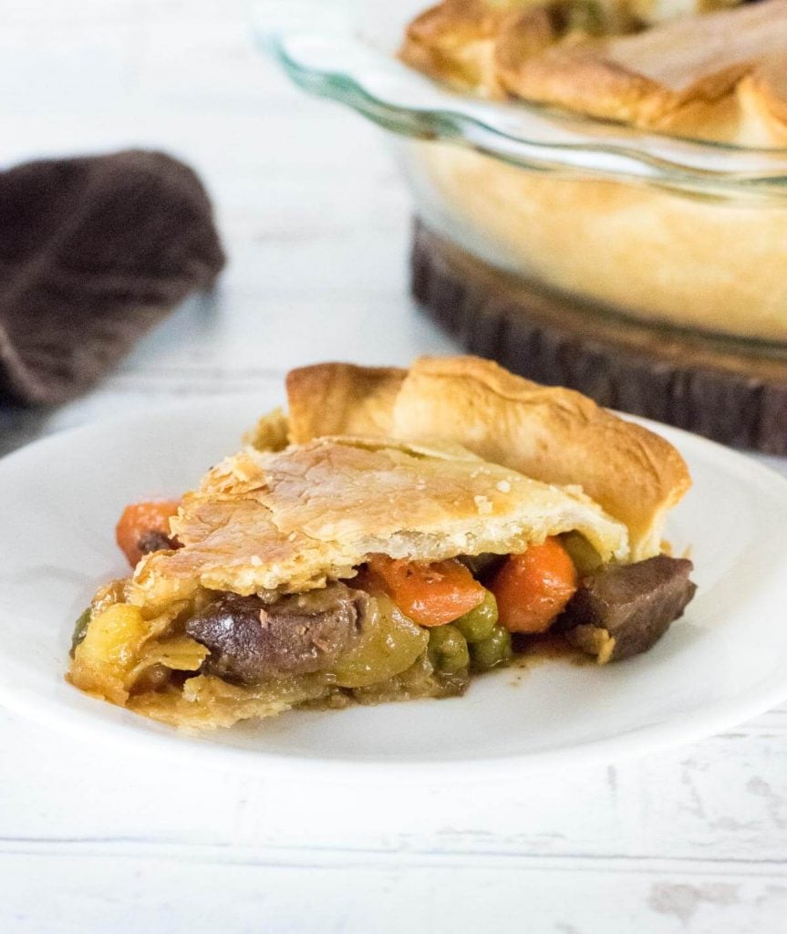 Slice of Venison Pot Pie on white plate