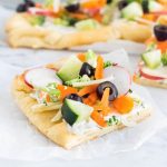 Crescent roll veggie pizza close up.