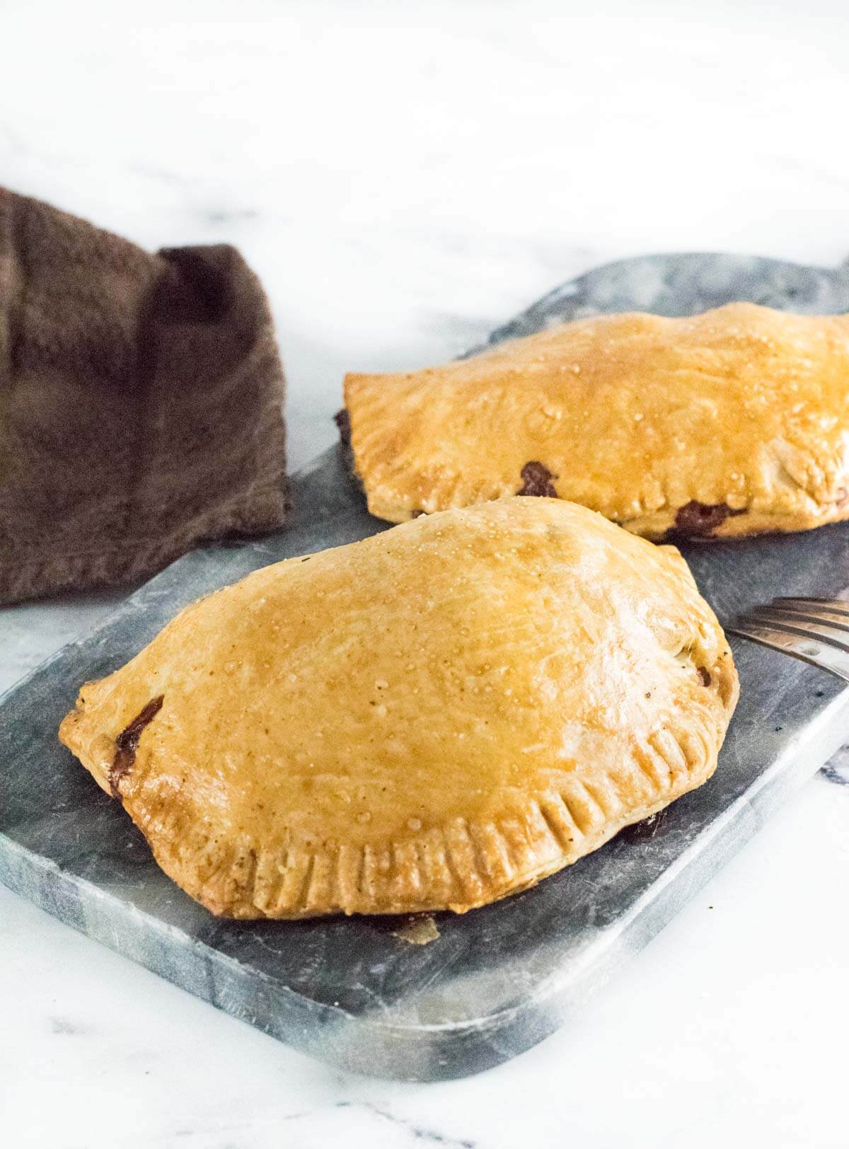 Michigan Pasties on a stone cutting board.