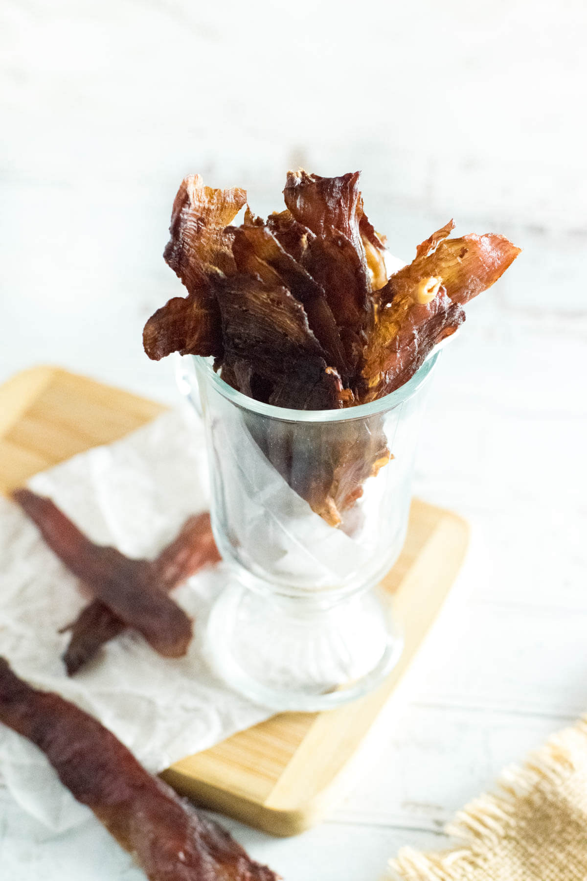 Pork jerky in a glass jar.