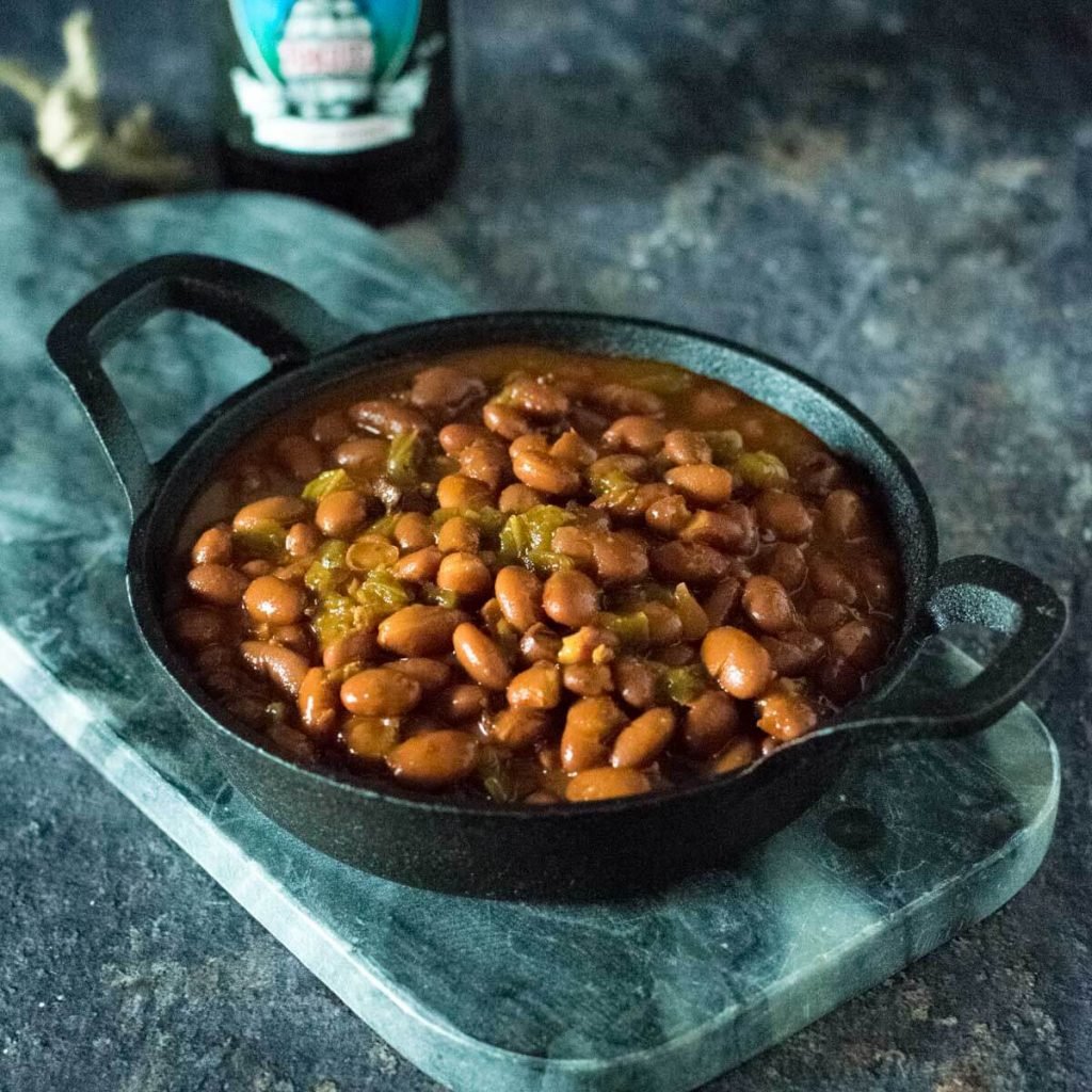Smoked baked beans on stone tray.