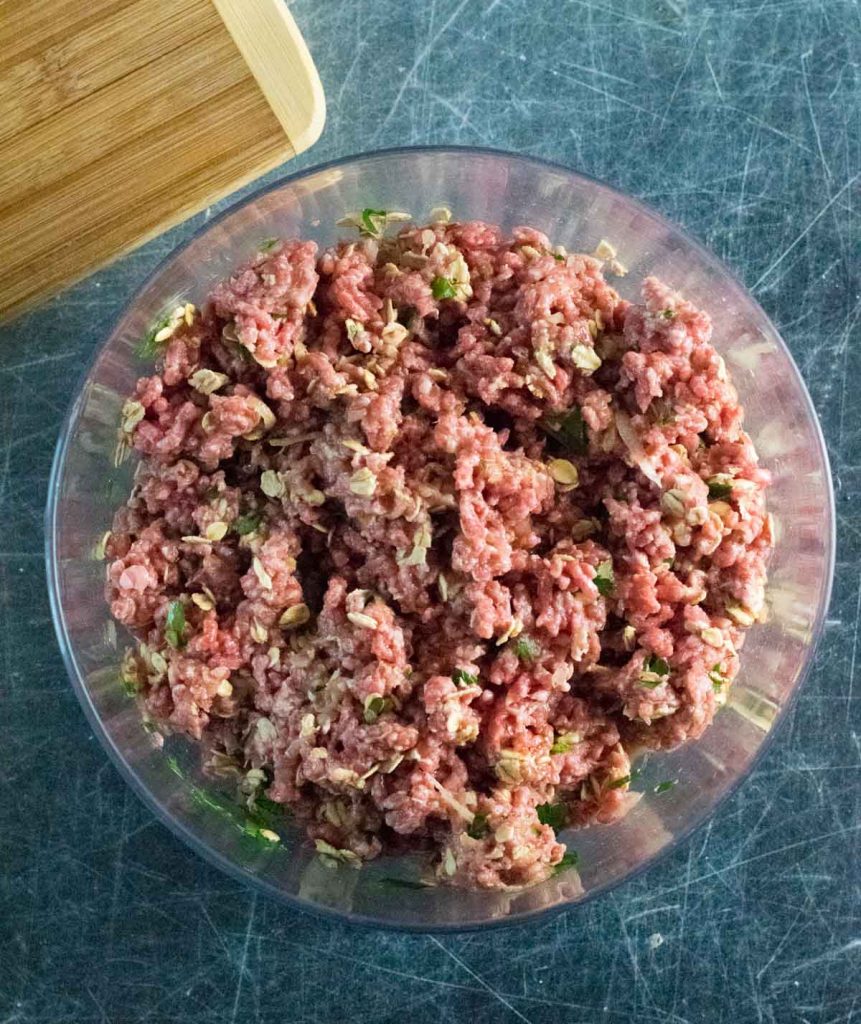A raw meatloaf mixture with oatmeal.