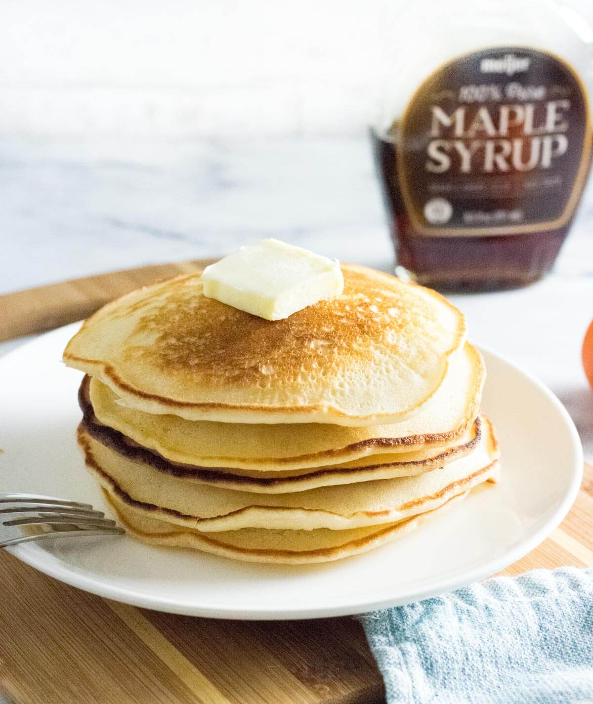 Eggless pancakes on white plate.