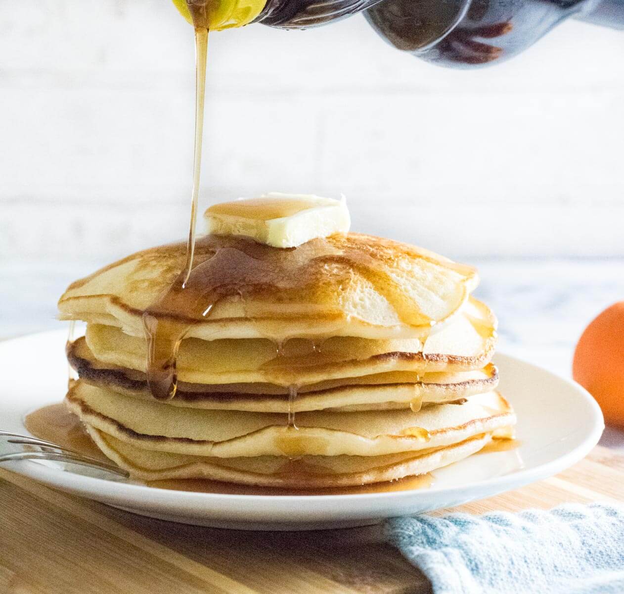 Pancakes without eggs drizzled with syrup.