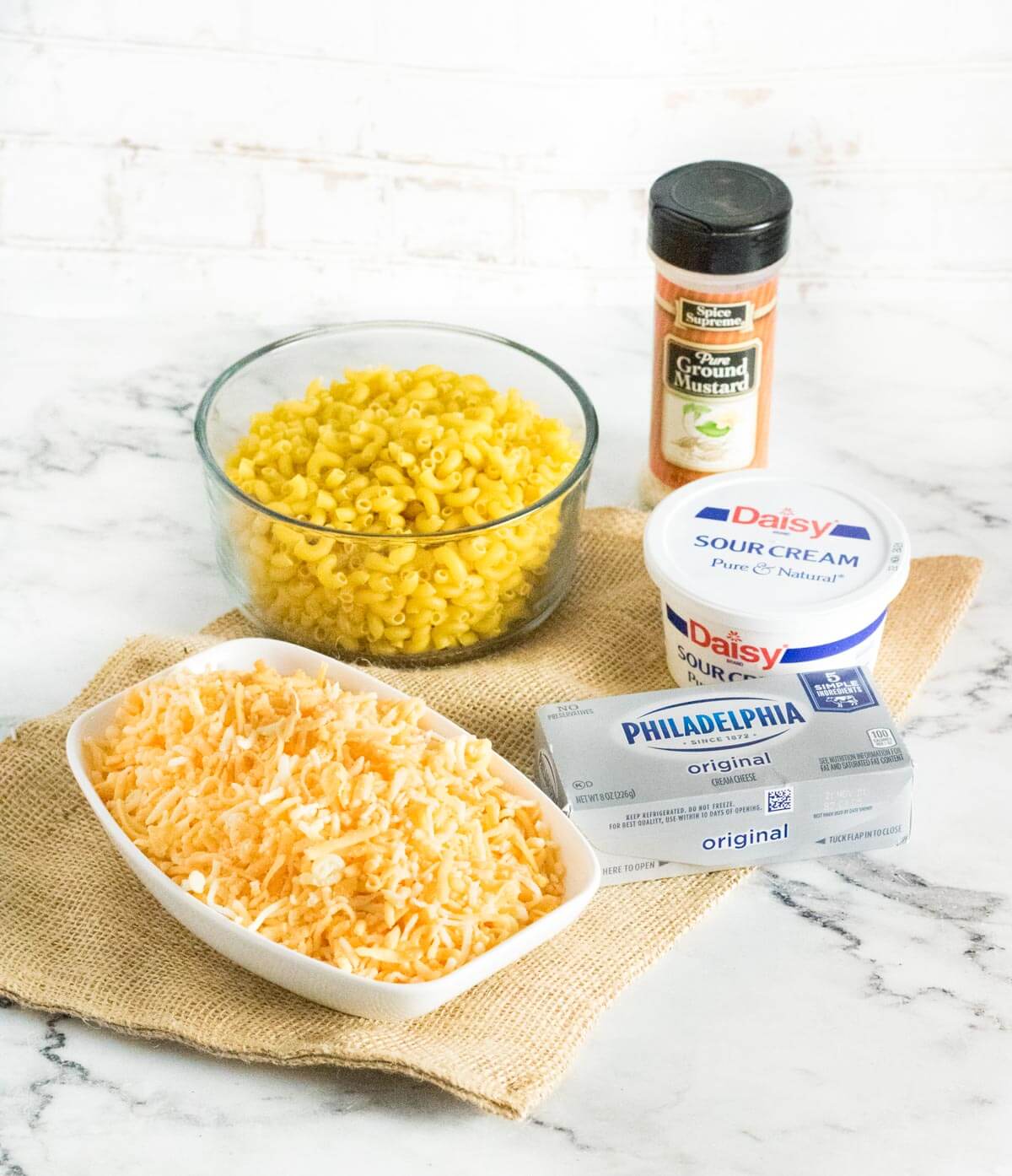 Showing ingredients needed for mac and cheese without milk.