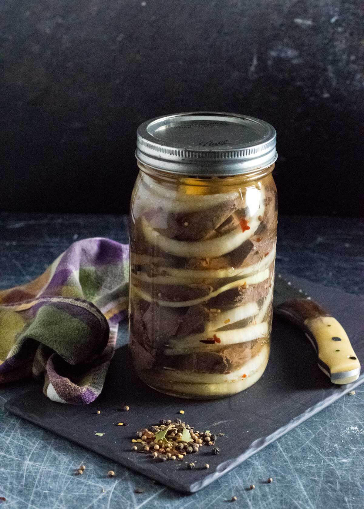 Pickled deer heart in jar.