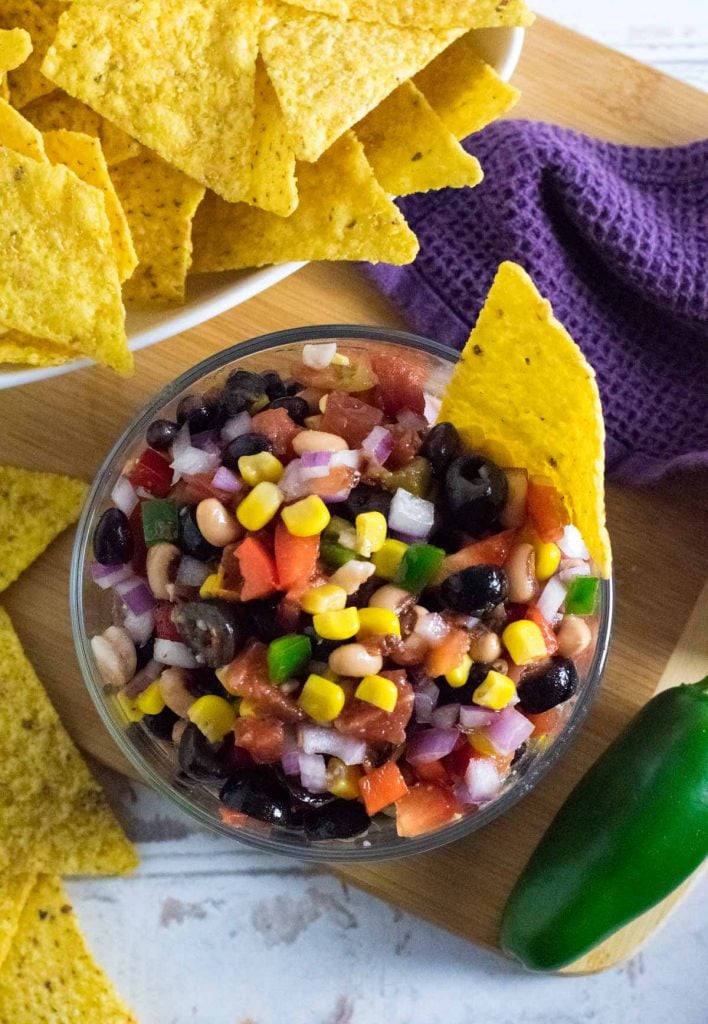 Redneck caviar dip with tortilla chips.